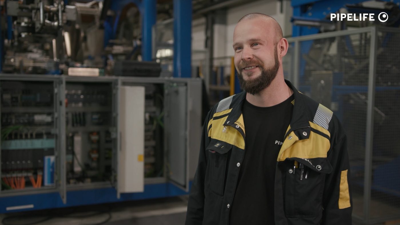 Man with beard and bald head in production